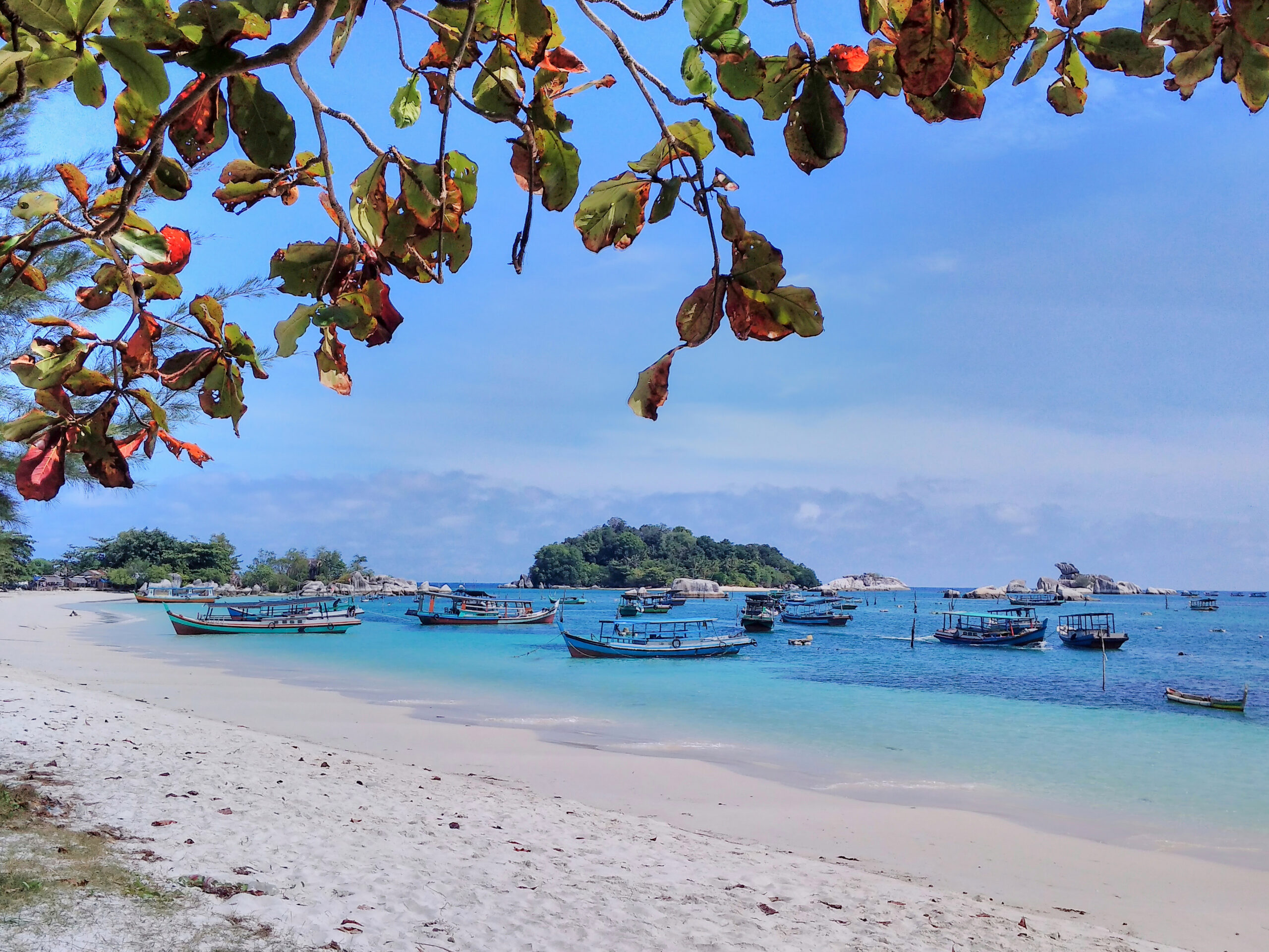 Traditional Boat at the Beautiful Tropical Tanjung Kelayang Beach in Belitung. Tanjung Kelayang Beach. Belitung Island, Indonesia.